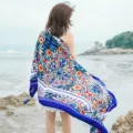 Detailed view of bohemian floral print beach towel scarf, ideal for summer holiday and travel. - L189