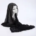 Close-up detail view of black crinkled sheer headscarf, showing lightweight texture. - 11