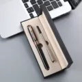 Metal ballpoint pen gift set with rollerball pen, refill, and elegant box for business. - Black Pen with Rose Gold Trim + Single Refill Pen Box