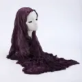 Close-up detail view of the dark purple crinkled hijab scarf showing fine fabric texture. - 19