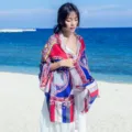 Detailed view of a vibrant ethnic print cotton linen shawl, perfect for beach and travel. - 18110
