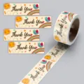 Close-up detail of rectangular cartoon thank you stickers roll, featuring cute sun and rainbow. - 120 Stickers/Roll / CT-04