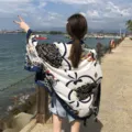 Summer beach shawl with chic chain print design, lightweight scarf for vacation sun protection. - Carriage Chain Blue
