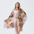 Detailed view of the lightweight georgette beach cover-up featuring abstract 3D print. - 2