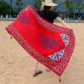 Detailed view of the retro ethnic style red sun protection shawl with exquisite patterns. - 314