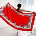 Red long silk scarf featuring elegant chain and tassel pattern, ideal for summer vacation wear. - Variant 234