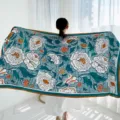 Floral print imitation silk scarf, ethnic style sun-protection large shawl for beach vacation. - Green Background with White Floral