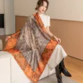 Elegant silk square scarf featuring classic camellia print and vibrant orange border for women. - Brown and Orange Willow Branches