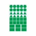Detail view of green geometric stickers featuring circles, triangles, squares, and rectangles. - Red