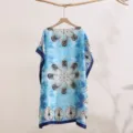 Detailed view of blue tie-dye print beach cover-up shawl, elegant floral abstract pattern fabric - 7
