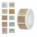 English quote sticker roll detail showing retro literary quotes and typewriter font designs. - 500 Pieces/Pack / Off White