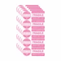 Pink fragile warning stickers details showing adhesive labels for shipping, mailing, and envelopes. - YSTZ-02