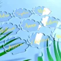 Clear acrylic cloud place cards with custom gold names, perfect for weddings and parties. - 20PCS