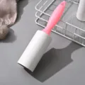Tearable lint roller with pink handle and white refill roll for clothes dust cleaning. - Pink (Includes 1 Paper Roll)