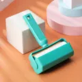 Green lint roller with tearable refill paper, pet hair remover for clothes and furniture. - Emerald Green