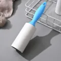 Blue handle lint roller variant with white sticky refill paper for clothes and furniture care. - Light Blue (Includes 1 Paper Roll)