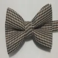 Classic houndstooth bow tie for men, elegant British style fabric accessory detail view. - Houndstooth 4