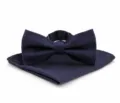 Navy blue bow tie and pocket square set detailed view featuring elegant fine twill fabric texture. - Navy Blue