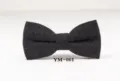 Close-up detail of dark grey wool bow tie, textured fabric for formal business wear. - YM-001