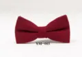 Close-up detail shot of the elegant burgundy wool bow tie, highlighting the fine texture. - YM-003