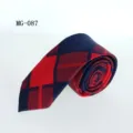 Detailed view of a fashionable men's cotton narrow necktie in a classic red and navy blue plaid pattern. - MG-087
