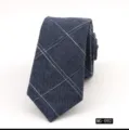 Detailed view of stylish men's navy blue plaid cotton narrow tie, perfect for casual party wear. - MG-092