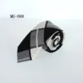 Close-up detail of the black and white plaid slim necktie, showing fabric texture. - MG-088