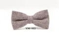 Detailed shot of brown wool herringbone bow tie, vintage winter groom wedding accessory. - YM-012