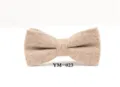 Detail shot of a brown wool tweed bow tie, featuring classic texture for formal events. - YM-023