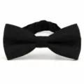 Detail shot of the black men's formal bow tie featuring a subtle paisley jacquard pattern. - Hook Flower Black (DZ-010)