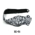 Detailed view of the black and white floral pattern and pointed shape on the cotton bow tie. - Black and White Floral Style(MG-054)
