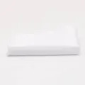 Detail shot of the white pocket square fabric texture, neatly folded cotton accessory. - White Edged