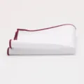 Pocket square detail showing clean white cotton fabric and neat burgundy rolled edge trim. - Wine Red Edge