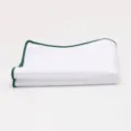 White pocket square detail featuring neat dark green rolled edges for men's formal suits. - Dark Green Edge