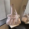 Pink polka dot ruffle shoulder bag with pearl bow pendant, stylish underarm tote bag for women. - Pink With Pendant