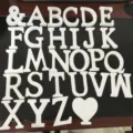 White wooden alphabet letters and symbol ornaments set for home decor and wedding props. - Natural Wood Color A-Z