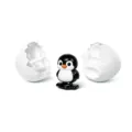 Lindo juguete de pingüino de cuerda con diseño de cáscara de huevo rota para niños. - Pingüino