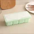 Praktische Plastik 4-Fächer Gewürzdose mit weißem Deckel für Küche und Zuckeraufbewahrung. - Grün