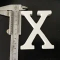 White wooden letter X ornament, wedding and home decor detail shot showing actual size with caliper. - White Letter X