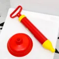 Manual toilet plunger air pressure unblocker red and yellow home bathroom drain cleaner tool - Unblocker