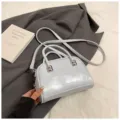 Trendy light blue Boston bag for women, PU leather handbag with metal decor and shoulder strap. - No Pendant / Blue