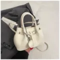 White woven bucket bag for women, stylish niche design PU leather crossbody handbag. - With Pendant / White