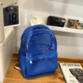 Blue mesh backpack for women, lightweight breathable casual daypack for summer beach travel. - Blue