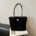 Black fuzzy plush tote bag with vertical stripes and thin shoulder straps, casual commuter style. - Black without Pendant
