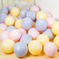 Macaron pastel latex balloons detail view showing blue pink and yellow color mix pack of 100pcs. - Macaron Blue + Pink + Yellow