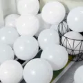 White latex balloons cluster detail shot, perfect for party and wedding decoration setup. - 100pcs Pack / White