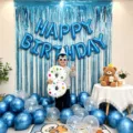 Complete birthday party decoration set with blue fringe curtain and foil balloons. - Blue Series
