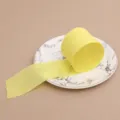 Light yellow crepe paper roll for party decoration, crafts, and DIY backdrops, 4.5cm width. - Light Yellow