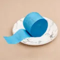 Blue crepe paper roll variant, ideal for party decoration, backdrop, and DIY craft projects. - Sky Blue