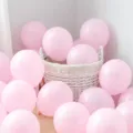 Matte light pink latex balloons set, perfect for birthday party and room decoration setup. - 100 Pieces/Pack / Matte Light Pink